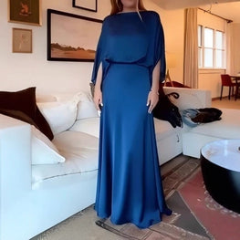 A Sleek Solid-color Satin Dress With Smooth Lines